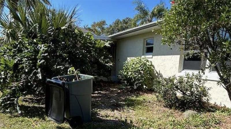 Exterior of a house that needs a lot of repairs